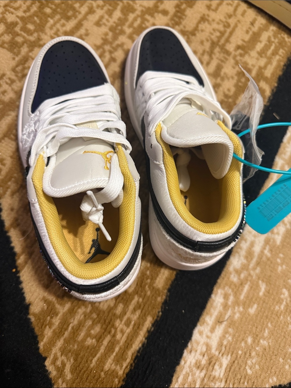 Kids White and Navy Athletic Shoes with Yellow Lining